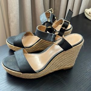 Black strapped wedges